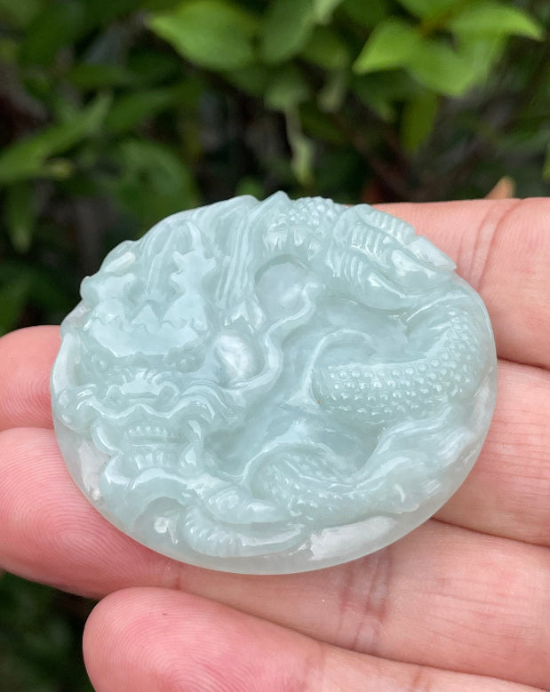 Fine texture of the authentic Myanmar jade pendant JP052 showcasing a traditional Dragon Feng Shui design for protection and prosperity