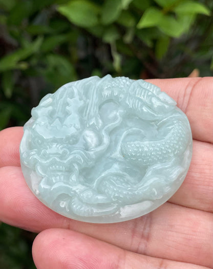 Fine texture of the authentic Myanmar jade pendant JP052 showcasing a traditional Dragon Feng Shui design for protection and prosperity
