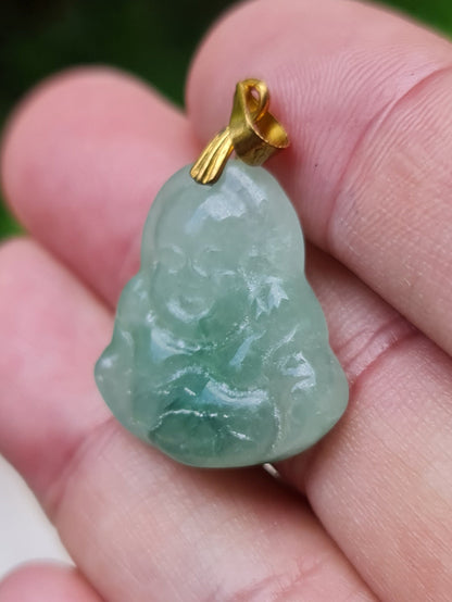 Fine texture of the authentic Myanmar jade pendant JHB001 showcasing a carved Laughing Buddha Feng Shui design for joy