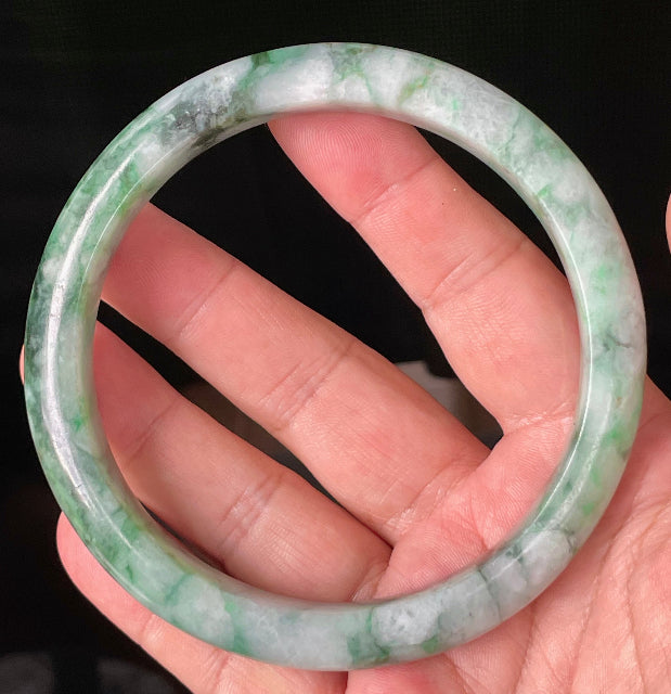 Classic round profile of 77mm icy imperial green, apple green, and greyish white Burmese jade bangle JB933