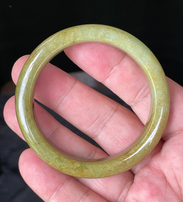 Flat inner and round outer edges of 52.4mm moss green, apple green, and brown Burmese jade bangle JB872