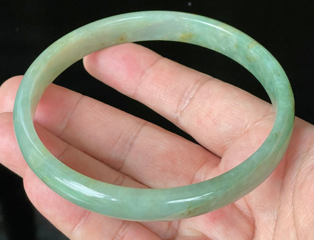 Flat inner and round outer edges of 77.5mm icy imperial and apple green Burmese jade bangle JB929