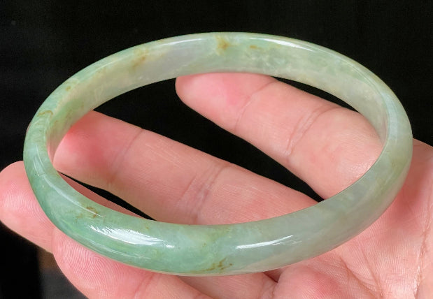 Flat inner and round outer edges of 77.5mm icy imperial and apple green Burmese jade bangle JB929