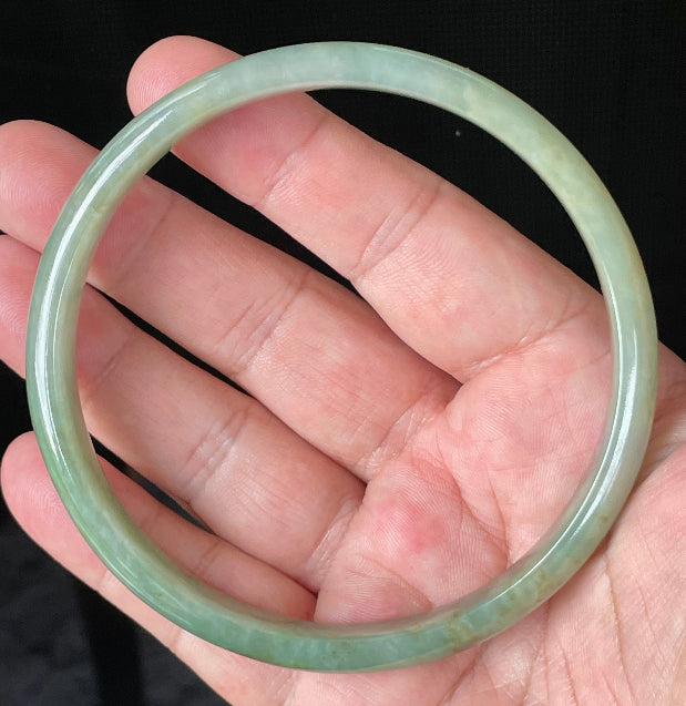 Flat inner and round outer edges of 77.5mm icy imperial and apple green Burmese jade bangle JB929